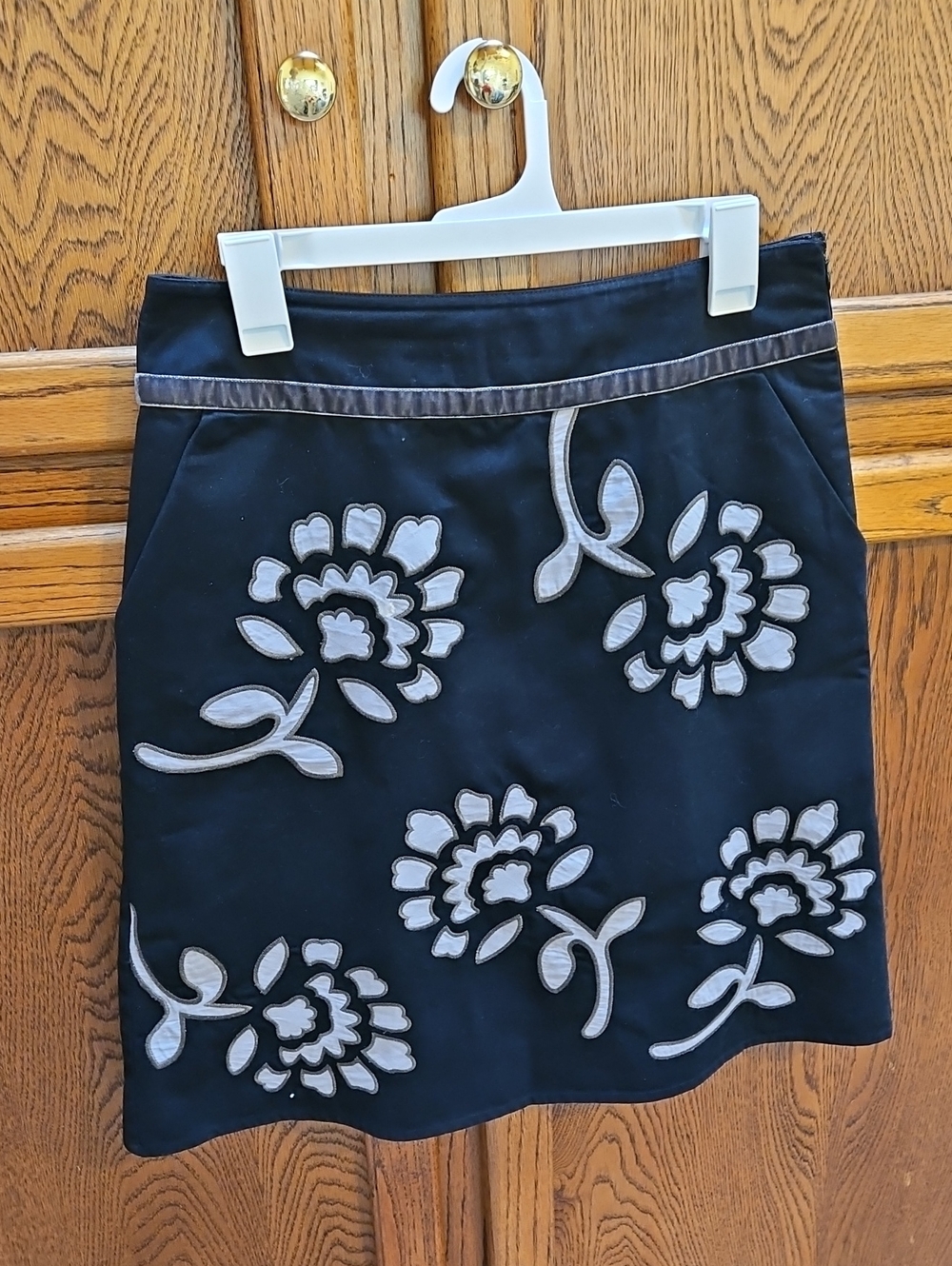 Boden A-Line skirt featuring gray floral appliqués - 10